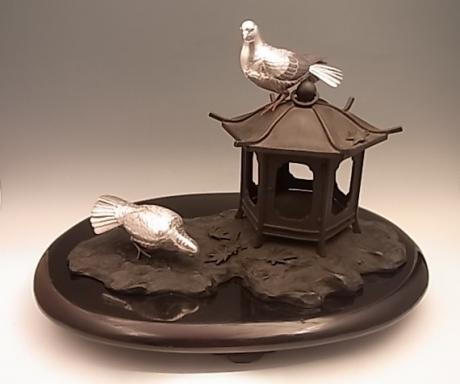 JAPANESE EARLY 20TH C. SILVER AND BRONZE PIDGEON AND LANTERN OKIMONO BY KANO SEIUN <br><font color=red><b>SOLD</b></font> 
