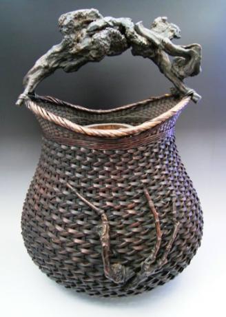 JAPANESE EARLY 20TH CENTURY LARGE BAMBOO FLOWER BASKET WITH ROOT HANDLE<br><font color=red><b>SOLD</b></font>