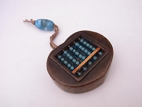 JAPANESE EDO PERIOD ABACUS NETSUKE DONE IN WOOD AND EDO GLASS<br><font color=red><b>SOLD</b></font>