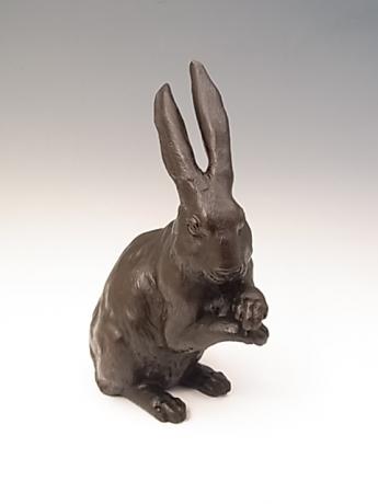 JAPANESE MID 20TH CENTURY BRONZE OKIMONO OF RABBIT BY NOBUMITSU