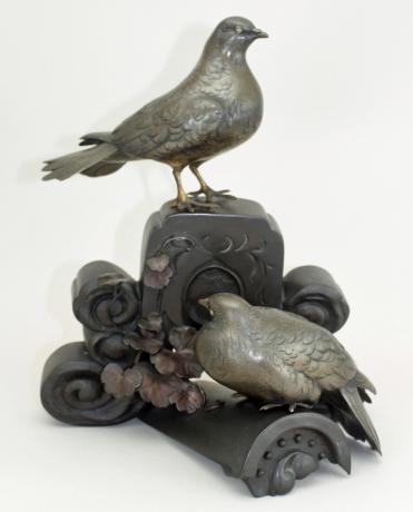 JAPANESE EARLY 20TH CENTURY BRONZE OKIMONO OF SHIBUICH1 DOVES ON BRONZE TILE ROOF<br><font color=red><b>SOLD</b></font>