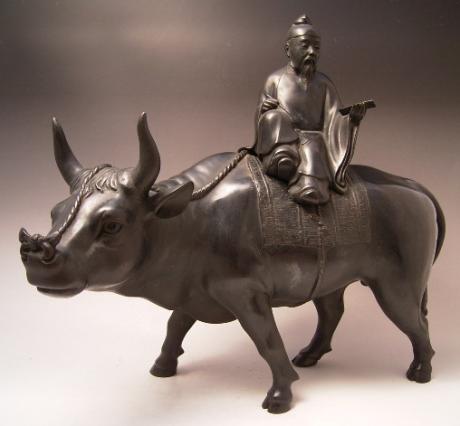 JAPANESE MEIJI PERIOD LARGE BRONZE OX AND SCHOLAR OKIMONO <br><font color=red><b>SOLD</b></font>